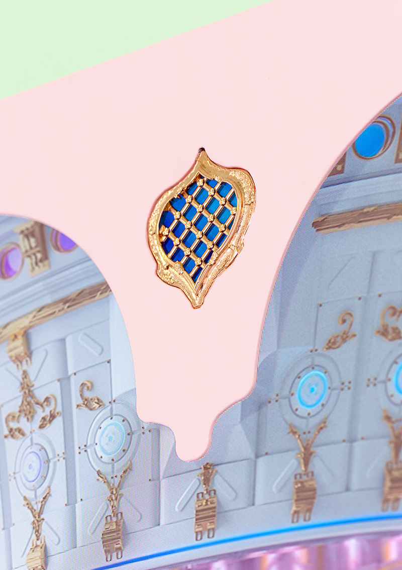 Detail of pink video sculpture showing gold details