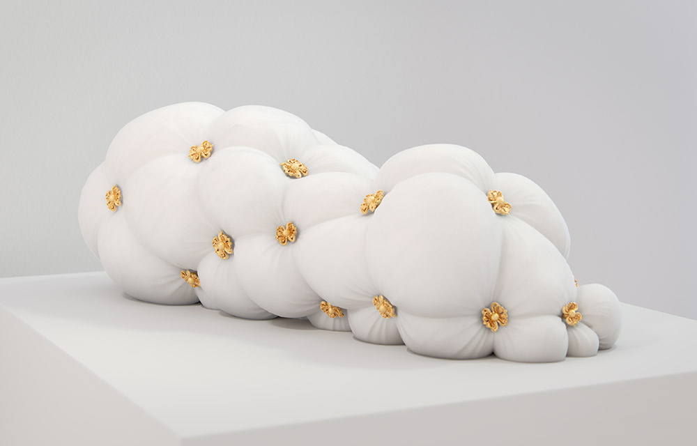 View of contemporary marble sculpture resembling a soft surface created using digital fabrication