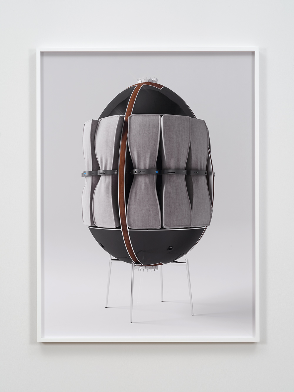 Surreal artwork with imagery of modern furniture and computer parts.